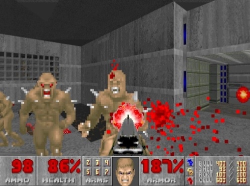 Doom 2 стреляет по врагам из дробовика, пока повсюду летит кровь.