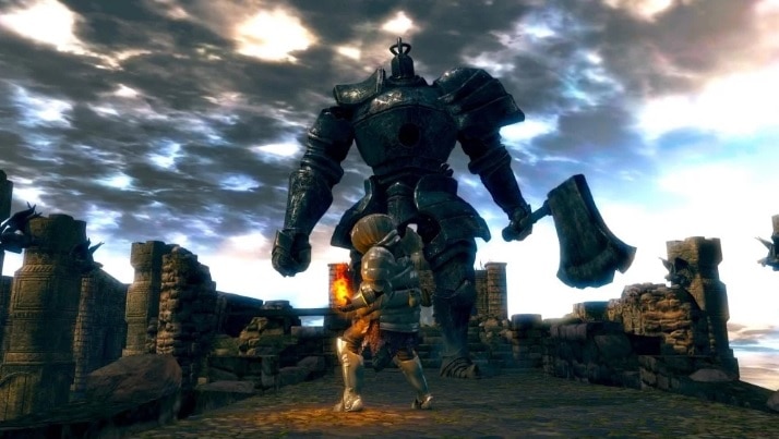 Скриншот Dark Souls Remastered, показывающий человека, готовящегося сразиться с гигантом с топором.